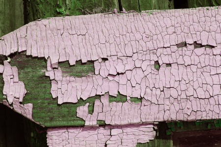 Old wooden texture with peeling paint, old blue board with cracked paint, vintage wood background, grunge plank. Old wooden background with remains of pieces of scraps of old paint on wood. Texture of an old tree, board with paint, vintage background peeling paint. old blue board with cracked paint, vintage, wood, background old blue board with cracked paint, vintage wood background, grunge plank.の写真素材