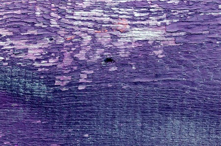 old blue board with cracked paint, vintage wood background, grunge plank. Old wooden background with...