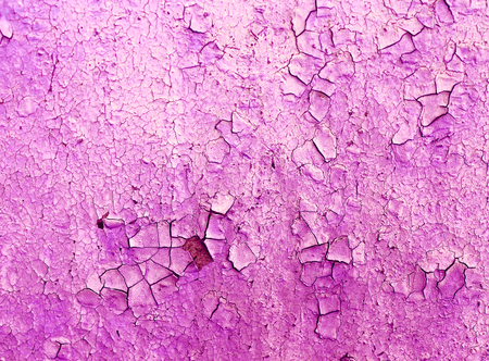 old blue board with cracked paint, vintage wood background, grunge plank. Old wooden background with remains of pieces of scraps of old paint on wood.の写真素材