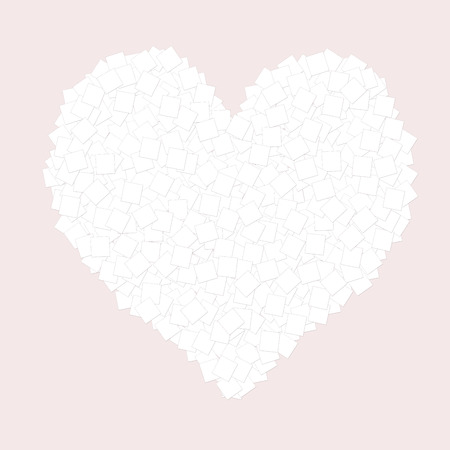 Heart of many pieces of paper on a pale pink background on Valentine's dayの写真素材