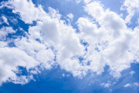 Blue sky with cloudsの写真素材