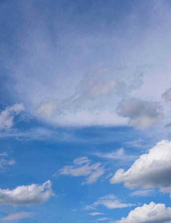 Blue sky with cloudsの写真素材