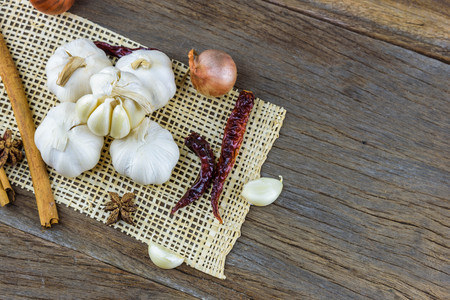 Spices on a wooden floorの写真素材