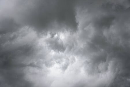 Rain clouds are gathering evening light from the sun as well.