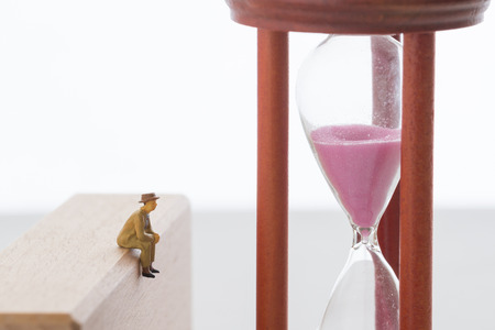 A hourglass and seniorの写真素材