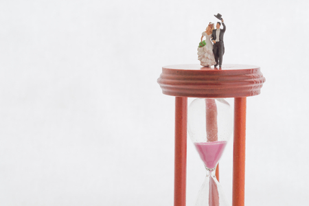A hourglass and bridal coupleの写真素材