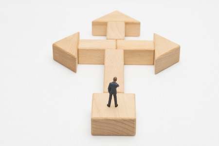 Businessman standing at a turning pointの写真素材