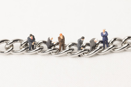 Businessmen in chainsの写真素材