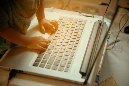 baby typing keyboad notebookの写真素材