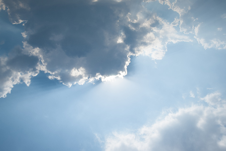 The sun breaks through the storm cloudの写真素材