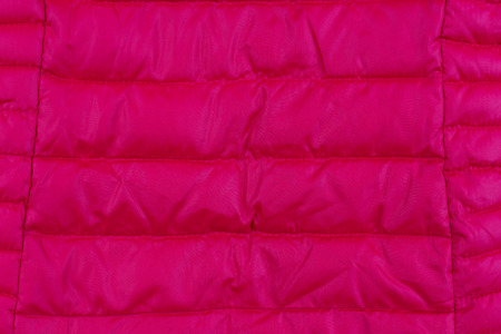 Texture of red down jacketの写真素材