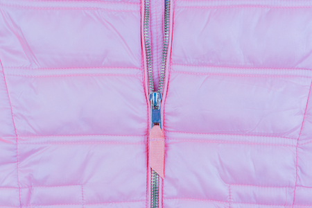 The texture of the pink jacket with zipperの写真素材
