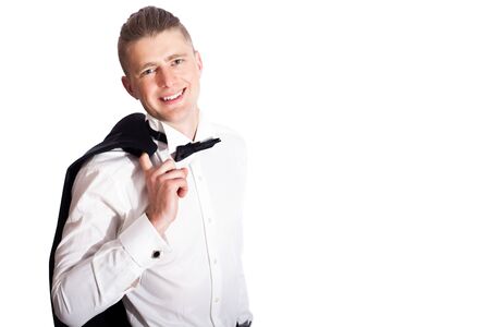 man in suit with jacket off relaxed isolated on whiteの写真素材