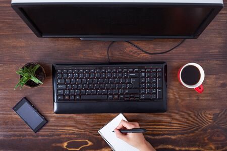 Woman working in the office regarding accountingの写真素材