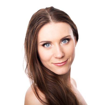 Beauty Girl Portrait. Beautiful Young Woman isolated on White Background. Fresh Clean Skin.の写真素材