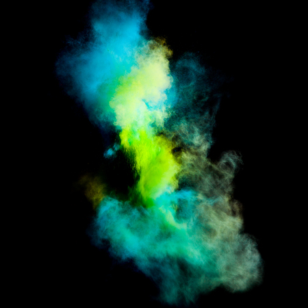 Colorful powders on black backgroundの写真素材