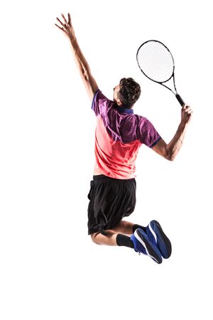 Young man is playing tennis isolated on whiteの写真素材
