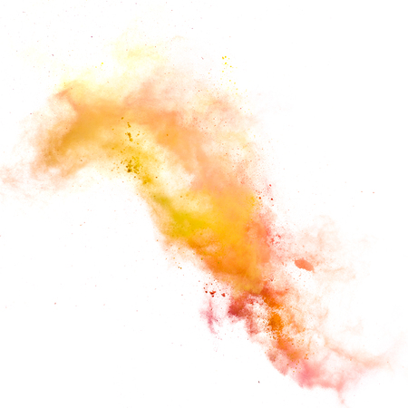 Freeze motion of colored dust explosion isolated on white backgroundの写真素材