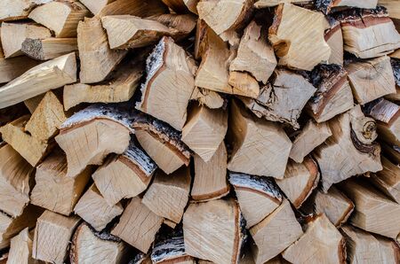 Birch firewood close up. Palenitsa firewood folded in several rows