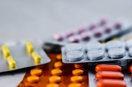 Pills for flu in the package close-up. The concept of treating colds, antidepressants, antibiotics,...