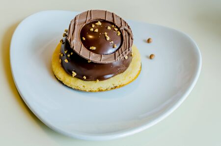 Cake on a plate in the form of a heart. Dessert for lovers.の写真素材