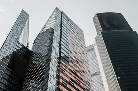 Moscow City in the summer of 2018. Russia. June 25, 2018. Moscow skyscrapers against the sky and clouds. High houses of the capital of Russia.のeditorial素材