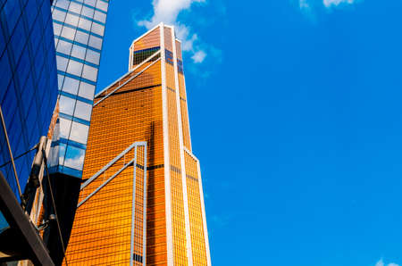 Moscow City in the summer of 2018. Russia. June 25, 2018. Moscow skyscrapers against the sky and clouds. High houses of the capital of Russiaのeditorial素材