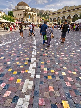 Athens/Greece - July 17 2019: Tourists and commuters in Monastiraki square in Athens, Greece.のeditorial素材
