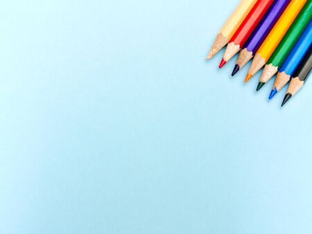 Color pencils isolated on light blue background with copy space.の写真素材