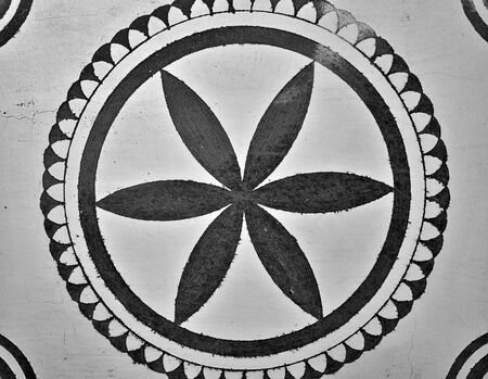 Decorative black and white geometrical shapes. Exterior wall detail from Pyrgi village, Chios island, Greece.の写真素材
