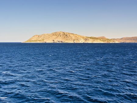 Uninhabited island and deep blue sea.の写真素材