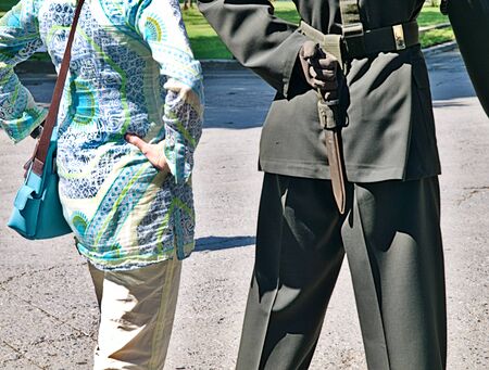 Woman posing for a photo beside  a soldier, Istanbul, Turkey.の写真素材