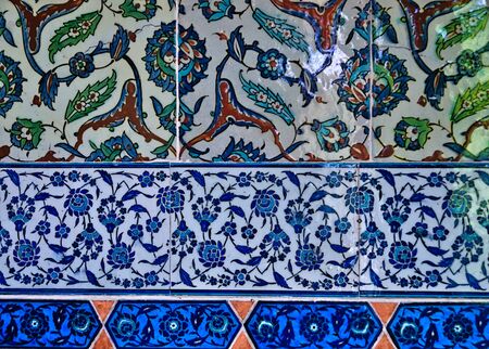 Classical oriental design detail on tiled wall at Topkapi Palace in Istanbul, Turkey.の写真素材
