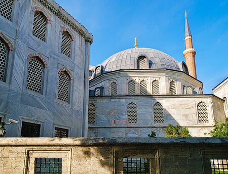 Blue mosque (Sultanhmet camii) dome and minaret, deep blue sky.の写真素材