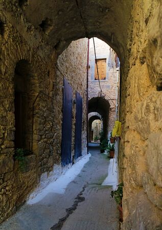 Medieval narrow alley, at the village of Mesta, Chios, Greece.の写真素材