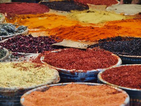 Multiple spices in colorful containers in Istanbul, Turkey market.の写真素材