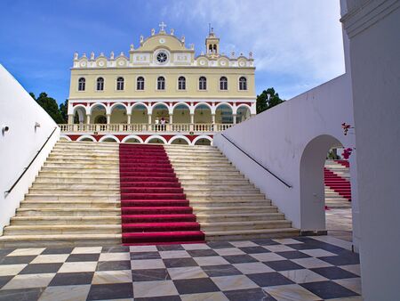 Christian orthodox church of Virgin Mary in Tinos island, Greece, staircase with red carpet and square pattern black and white floor.のeditorial素材