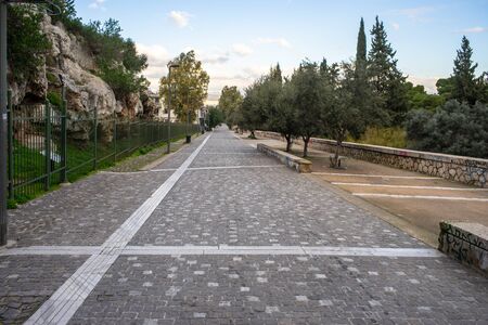 Athens, Greece, Dionysiou Areopagitou street, early morning with no people.  Pedestrian walkway...