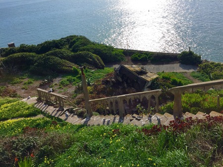 Broken stairs next to the ocean at Alcatraz island, San Francisco, California
