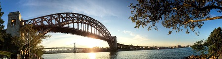 The Hell Gate Bridge, the railroad bridge, in front of Triborough bridge ( Robert F. Kennedy bridge)...
