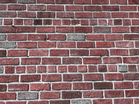Dark red brick wall texture in vintage styleの写真素材