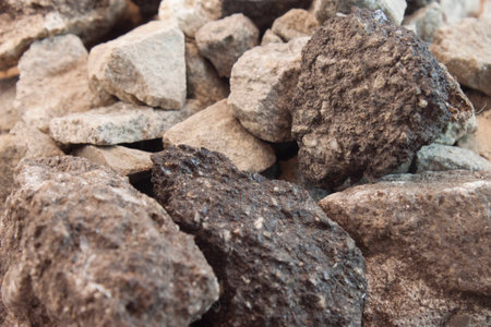 many shallow river stones as a backgroundの写真素材