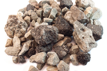 many shallow stones on a white backgroundの写真素材