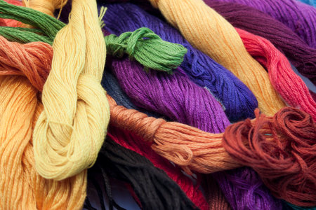varicoloured threads in spools for sewingの写真素材