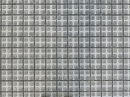 Background of a wall made of square tiles. Texture of square tiles.の写真素材
