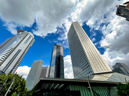 Shinjuku skyscrapers, blue sky and white clouds, daytimeの写真素材