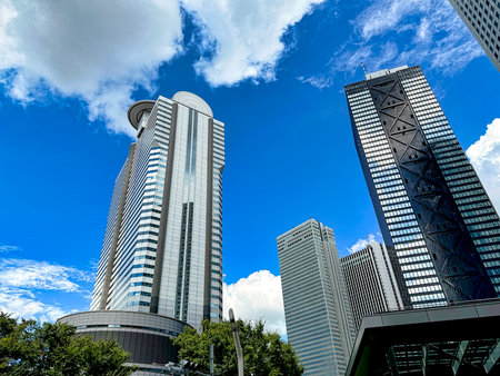 Shinjuku skyscrapers, blue sky and white clouds, daytimeの写真素材