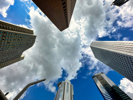 Shinjuku skyscrapers, blue sky and white clouds, daytimeの写真素材