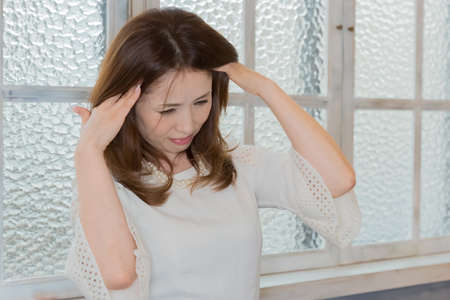 Lady with headacheの写真素材