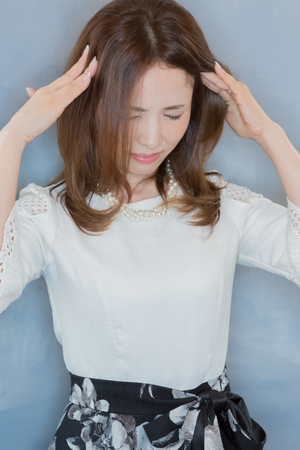 Lady with headacheの写真素材